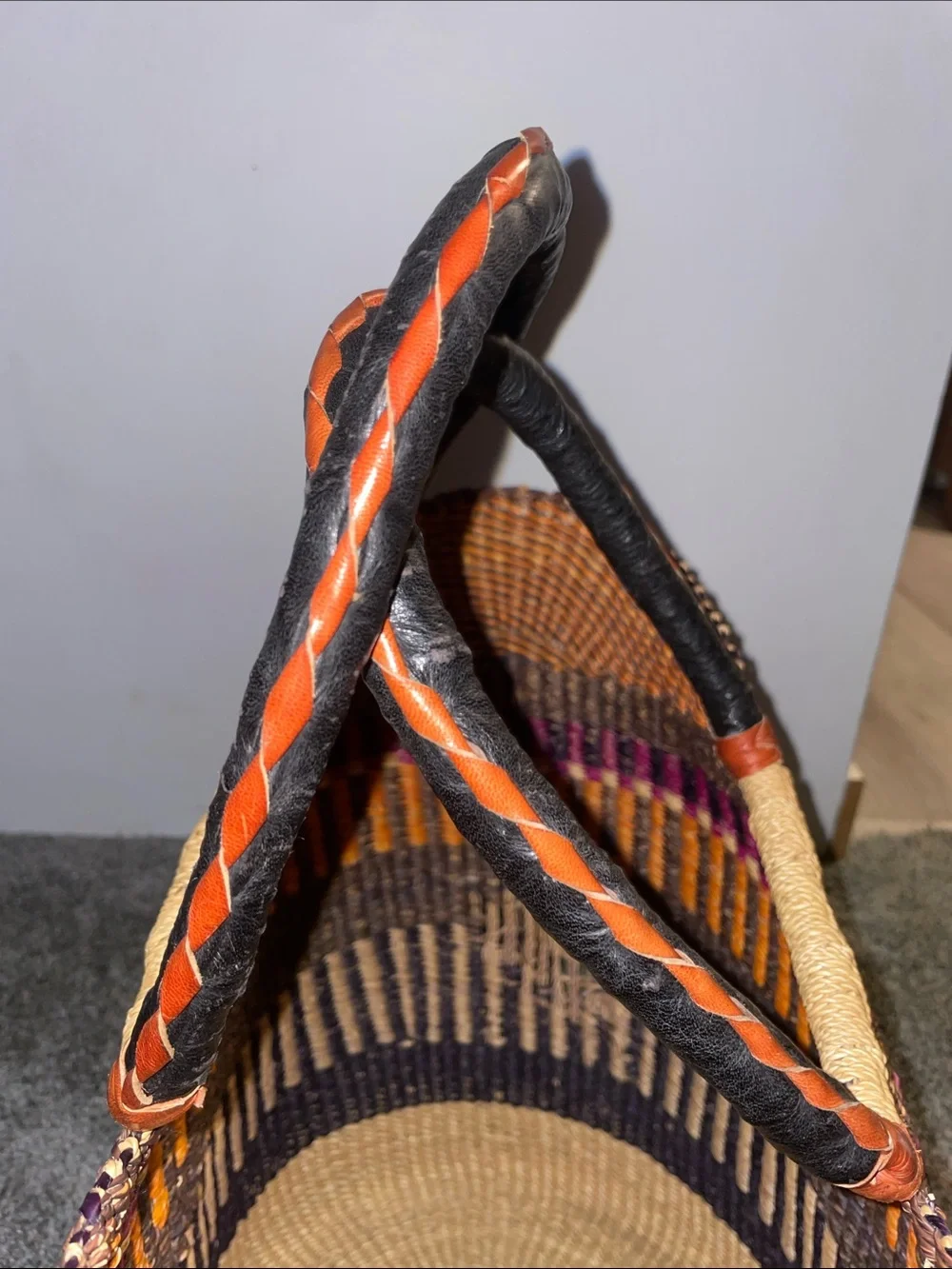 handwoven U-shaped Bolga basket (or market tote) from Ghana